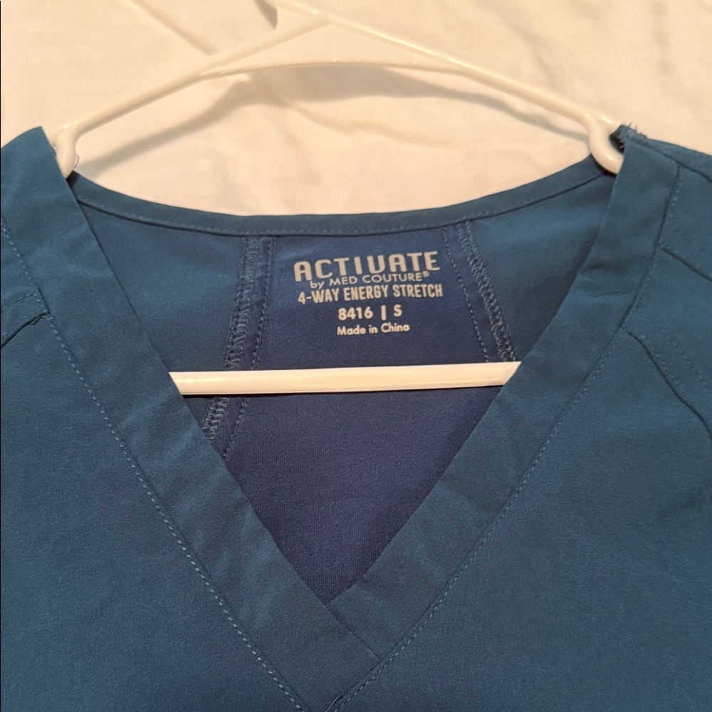 Med Couture Activate Women's Teal V-Neck Top